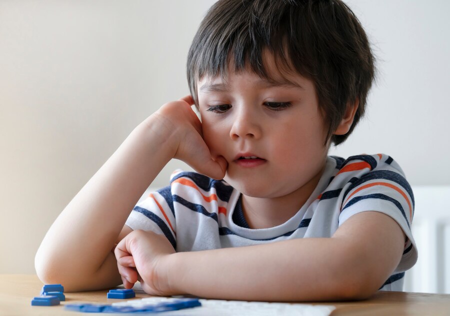 Boy and puzzle and Understanding the Different Types of Autism